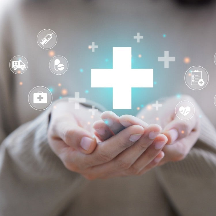 cupped hands with a medical cross above them