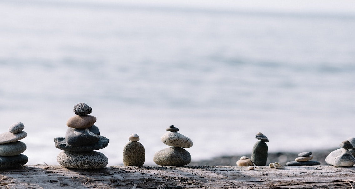 piles of stones on beach