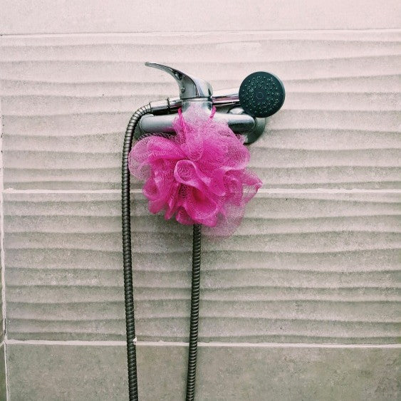 shower with pink wash scrunchie