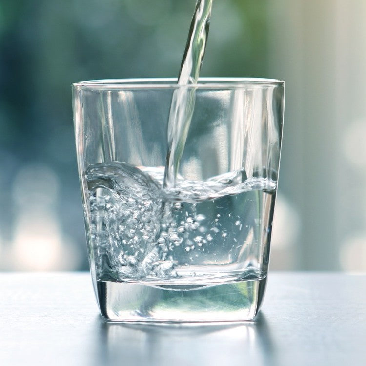 water pouring into a glass