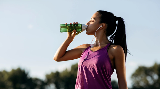 woman drink bottle of water