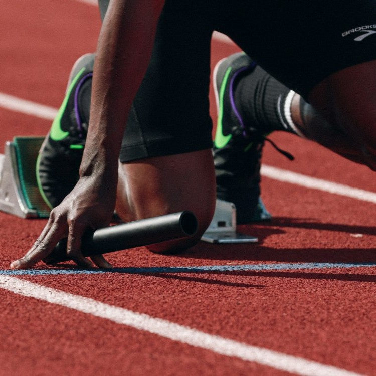 relay runner in start position