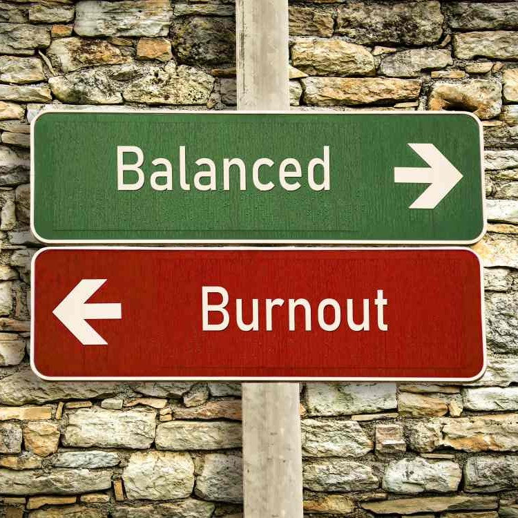 Sign post with Balanced and Burnout on it