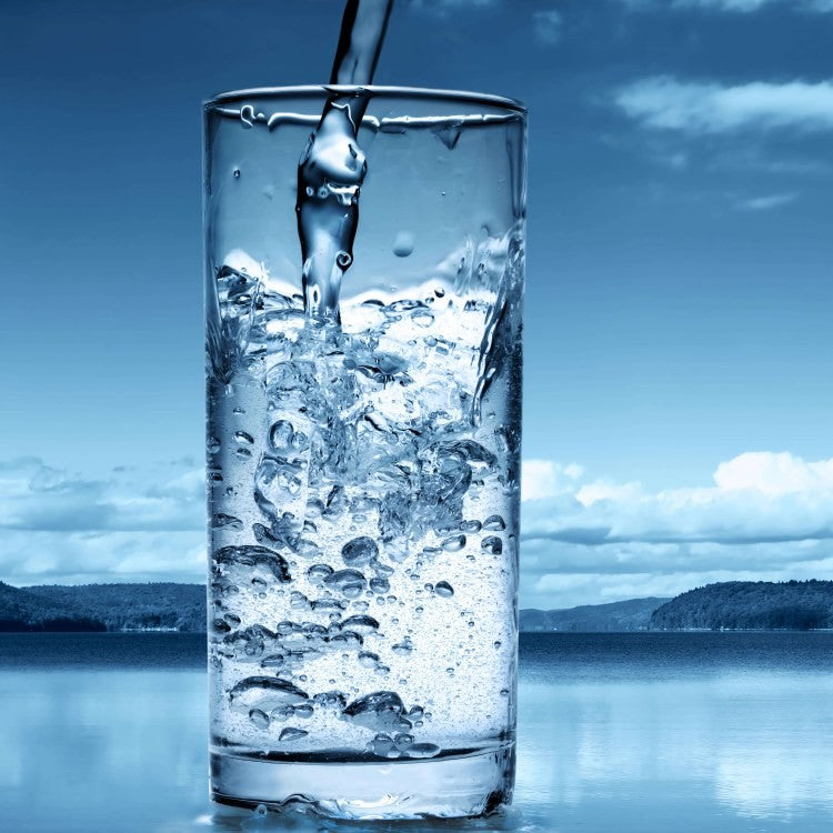 water pouring into a glass