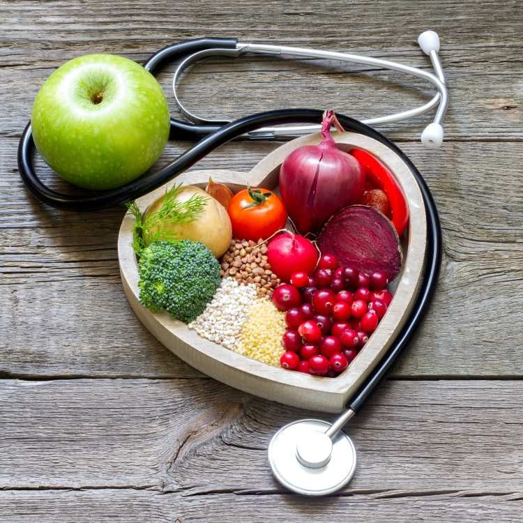 heart shape of healthy food with a stethescope