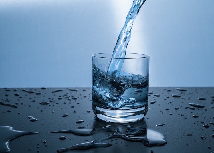 water pouring into a glass
