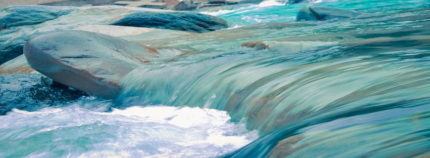 a stream, water tumbling over rocks