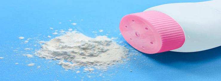 Baby talcum powder container on blue background