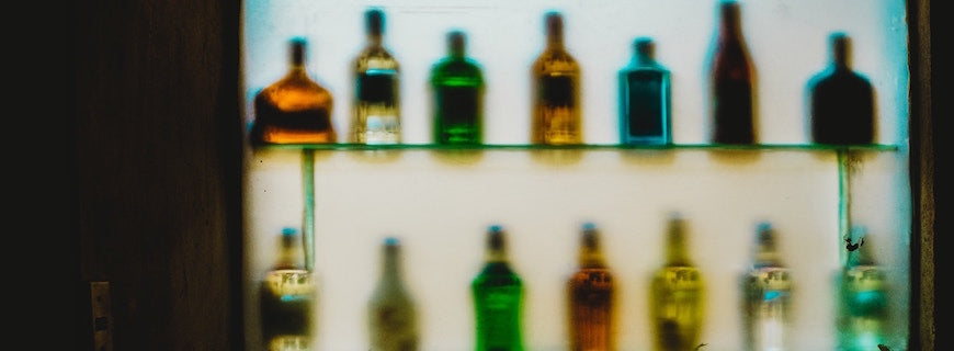 image of a distorted gantry of whisky bottles