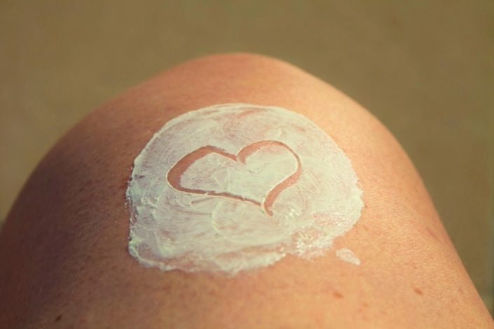 sunscreen on skin with heart shape
