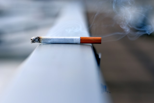 Cigarette burning on a wall