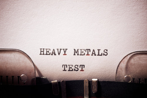 Paper in typewriter printed with heavy metals test