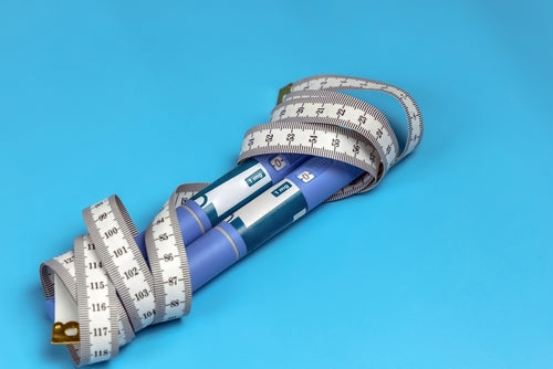 ozempic injections and tape measure