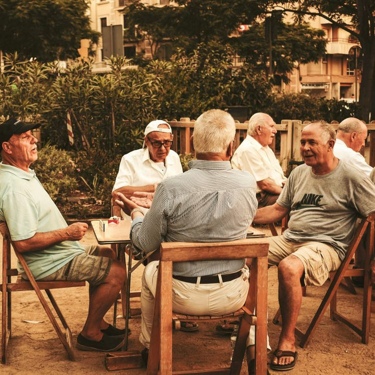 old men sitting at a table