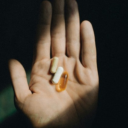 hand holding tablets