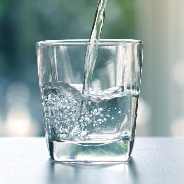 water pouring into a glass