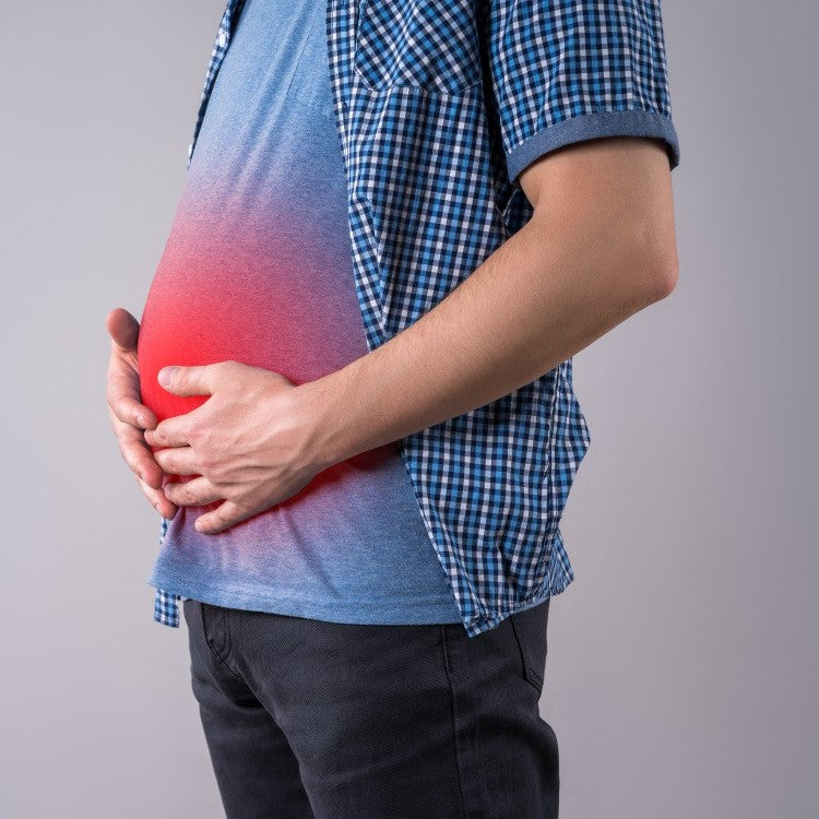 person holding stomach