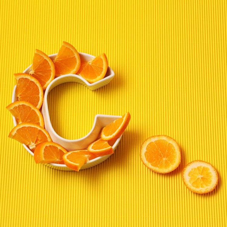 slices of oranges in a C shaped bowl