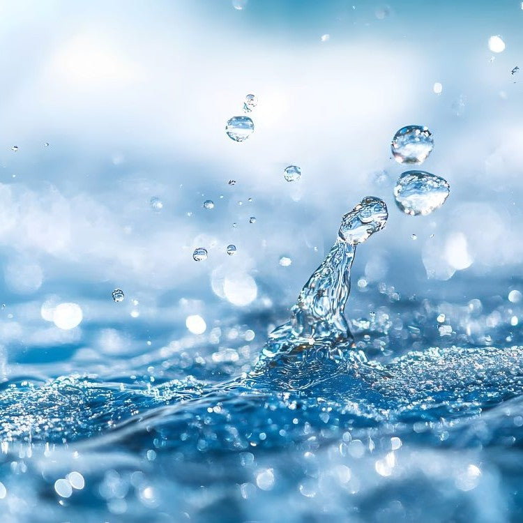 splash of water on blue background