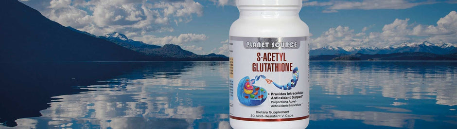 bottle of glutathione against background of a lake