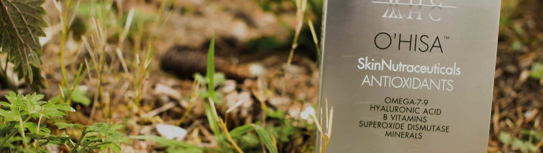 box of O'Hisa capsules on forest floor background