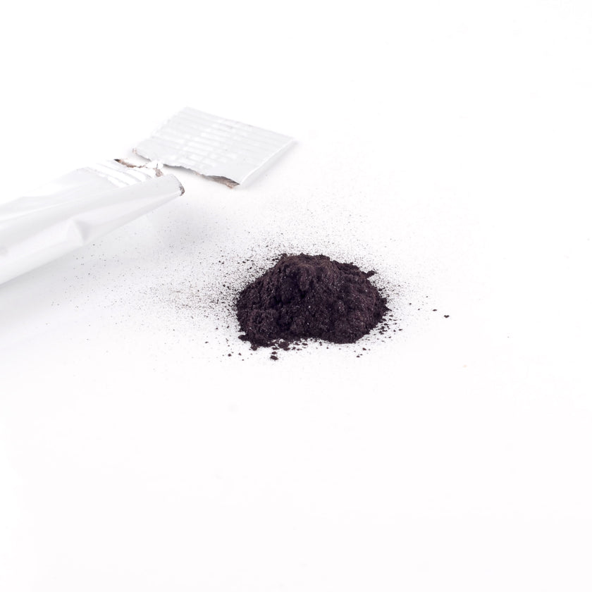 open sachet of humic and fulvic powder and contents