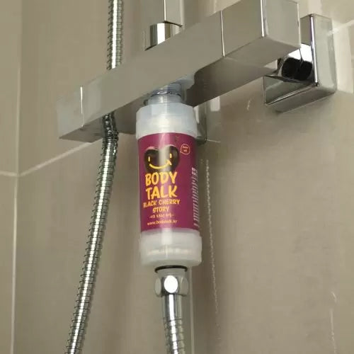 Biocera cherry shower filter fitted at end of shower hose